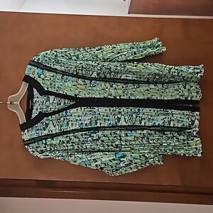 Very cute light weight stretch top 25 inch pit to pit 28 inch length